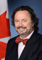 The Hon. Dennis Dawson, B.A., M.B.A.