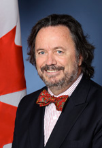 The Hon. Dennis Dawson, B.A., M.B.A.